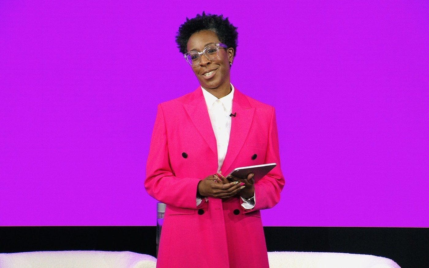 Dr. Shirleena Celestine, PhD, presenting on stage